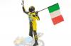 Figur Valentino ROSSI 1996 125 ccm stehend mit Fahne 1:12